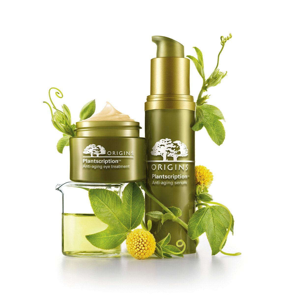 Green skincare products labeled 'Origins Plantscription Anti-aging eye treatment and serum' surrounded by green leaves and yellow flowers.