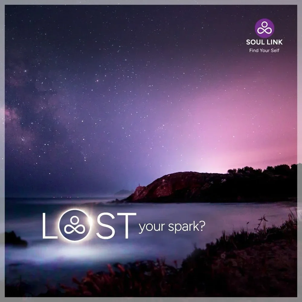Nighttime coastal landscape with stars, a silhouetted hill, and the moon reflected on water. The text reads 'LOST your spark?' with the Soul Link logo and tagline 'Find Your Self' in the top right corner.